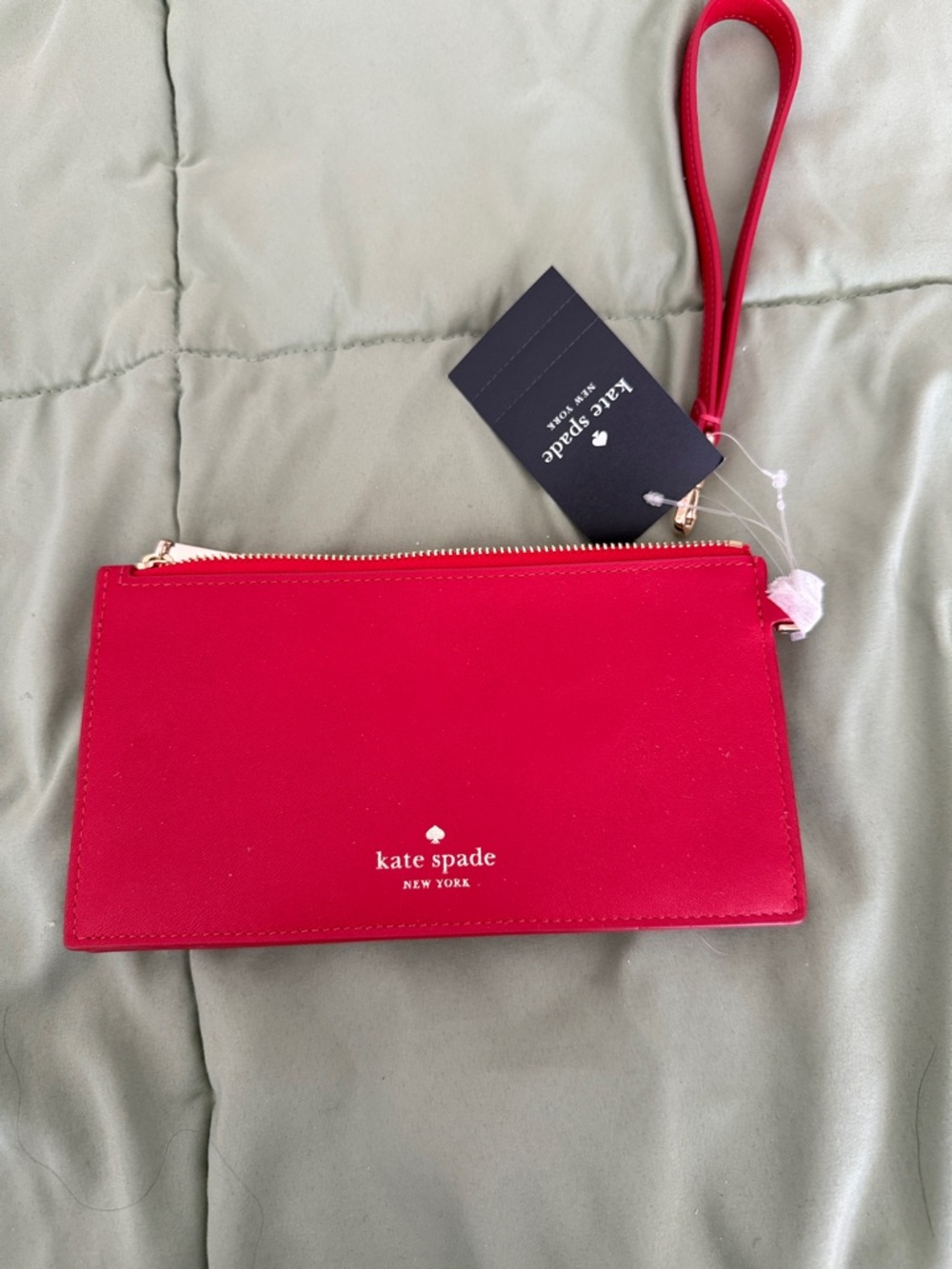 kate spade Red Leather Wristlet with Gold Accents